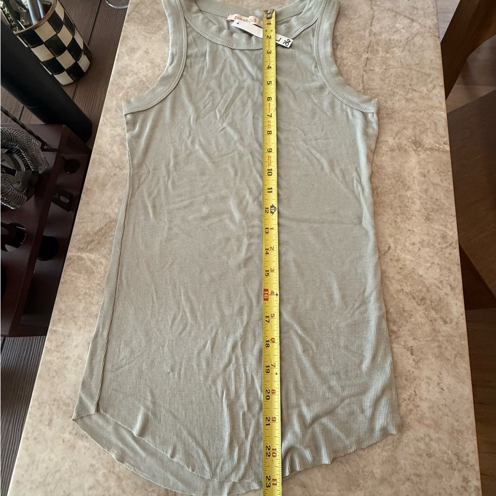 Olivaceous Light gray/pale celery green tank top.